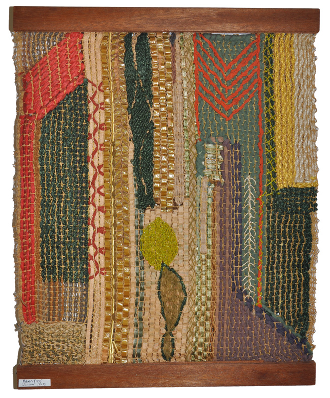 Glorified Lemon Bag, ca 1950
Mixed fibers, straw, and paper
with wooden slats, approx.
20 1/2 x 16 1/4 inches inv-026