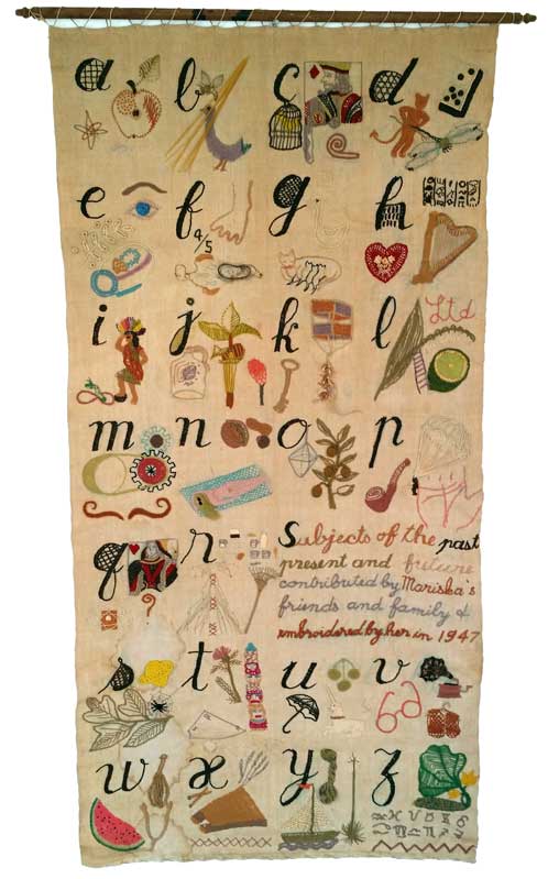 Alphabet, ca 1947
Mixed fibers, metal wire, and
plastic on linen with wooden
dowel, approx. 53 x 26 1/4 inches -INV 031